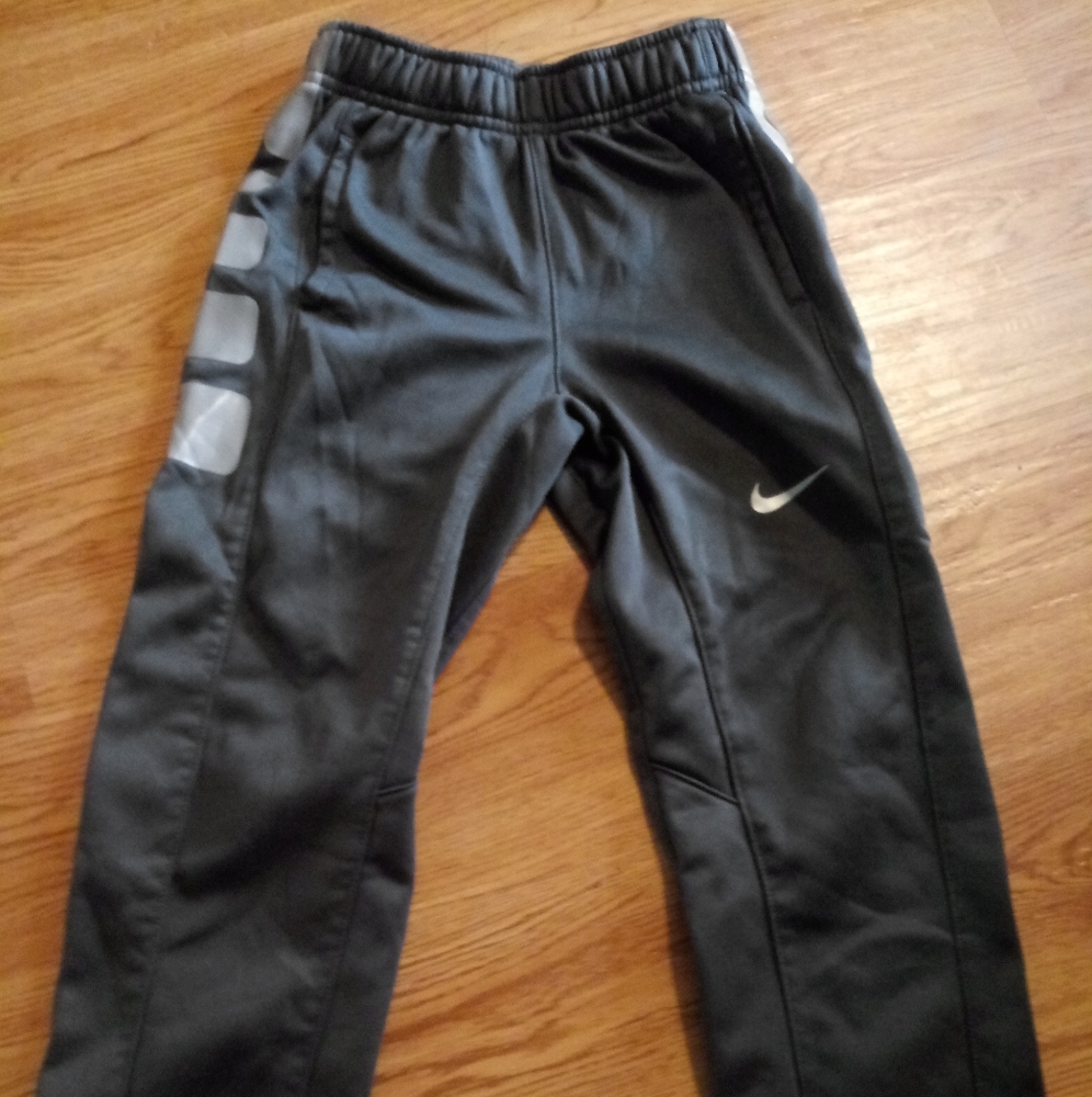 Boys Nike thema fit pants and nike zip up jacket